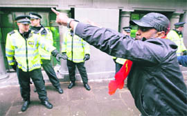 A demonstrator outside the Indian High Commission in London on Monday.
