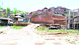 An incomplete structure of the Sheikh Noor-ud-Din Wali shrine 14 years after it was gutted.