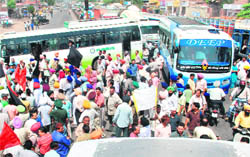 Punjab government employees block NH 21 at Balongi, Kharar, on Tuesday. 