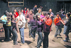 Youngsters shake a leg with Anubhav (front, in red shirt) of Planet Fitness-8