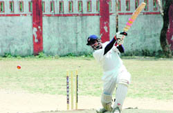 Garhwal Sport Academy's batsman miss out a shot at the Hukum Singh Memorial Cricket Tournament.