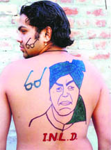 An INLD supporter displays his loyalty in Sirsa
