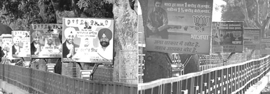Illuminated billboards of political parties have come up on the road separating Phases VII and VIII in Mohali