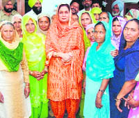 Charanjit Kaur, wife of Pratap Singh Bajwa, with village women