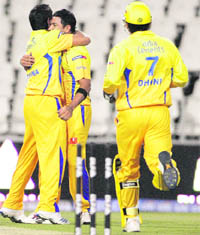 Shadab Jakati (C) of the Chennai Super Kings is congratulated by team mates after bowling out Tillakaratne Dilshan on Saturday.