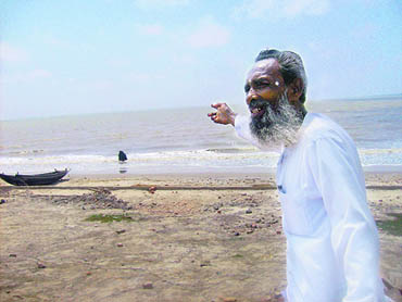 Jalaluddin Saha shows where his second home used to be eight years ago