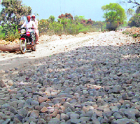 The under-construction Landoura-Manglore road.
