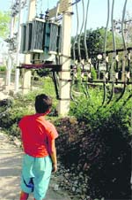 A low-lying transformer in Jammu. Tribune photo: Anand Sharma