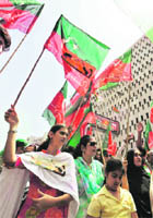 Activists of Pakistani Tehreek Insaf (PTI) march during a protest in Karachi on Sunday. The Sindh home department has banned the entry of Imran Khan into Sindh.