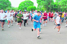 Gurgaon residents take part in a run on Sunday.