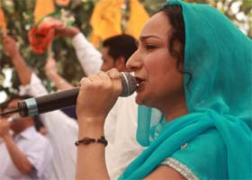 Satwinder Bitti performs at a rally