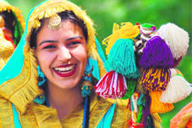 A young girl in a cheerful mood at the annual function of Sat Guru Ram Singh Polytechnic for Women in Ludhiana