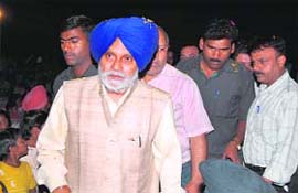 Charanjit Singh Atwal of the SAD campaigns in Koom Kalan village