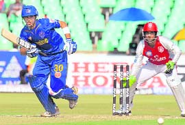 Naman Ojha of Rajasthan Royals runs a quick single as Kumar Sangakkara of Kings XI Punjab looks on in Durban on Tuesday.
