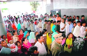 People wait in long queues for tickets at Chandigarh railway station