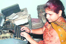  Visually impaired Mamta at her office in Rewari on Wednesday.