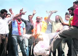 Members of the Kranti Dal protest in Jammu on Wednesday against the Taliban action against Sikhs in Pakistan