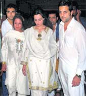 Condolence couture: Who says the colours of mourning cannot spell style. Here're Fardeen Khan and family members sporting different shades of white.