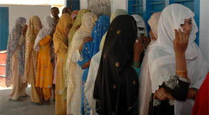 Women queue up to cast their votes at Rewasan village on the Gurgaon-Mewat Road on Thursday.