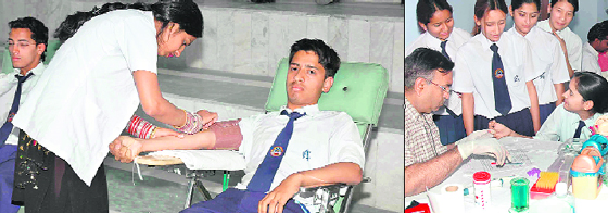 A blood donation camp being held by a Red Cross Society, Dehradun chapter; and (right) a health checkup camp underway at a Dehradun school.
