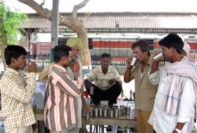 Volunteers of the Goodwill Society serving water at the railway station in Bathinda