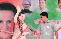 Congress president Sonia Gandhi waves to the crowd at an election rally held at the Parade Ground in Dehradun on Saturday.