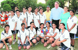 Welham girls team with the trophy in Dehradun on Saturday.