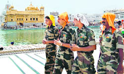 Jawans of paramilitary forces at the Golden Temple in Amritsar on Saturday.