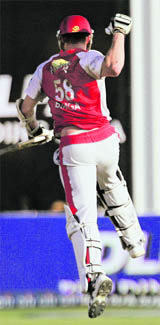 Kings XIs Brett Lee celebrates after his team defeated Deccan Chargers in Kimberley on Saturday.