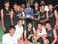 Dehradun team with their trophies in Dehradun on Sunday. Tribune photographs
