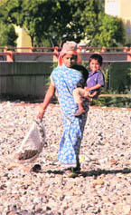 This mother toils on a day celebrated for her.