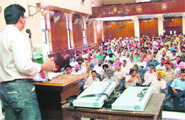Two EVMs to be used for 30 candidates being introduced to polling staffs during a rehearsal in Ludhiana on Sunday.