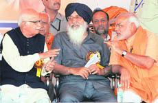 Prime ministerial candidate of the NDA LK Advani, Punjab Chief Minister Parkash Singh Badal and Gujarat CM Narendra Modi at a rally in Ludhiana on Sunday.