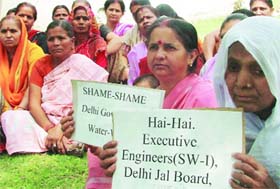 Residents of West Delhi protest against the Delhi government and demand more water supply in the area outside the Delhi Jal Board office