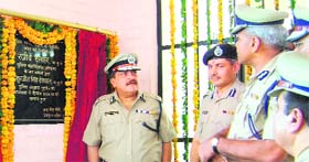 Haryana DGP RS Dalal inaugurates a building of the Sadar police station as senior police officials look on at Sohna town in Gurgaon district