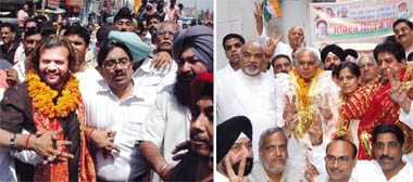 SAD candidate Hans Raj Hans with Mayor Rakesh Rathore and (right) Congress candidate Mohinder Singh Kaypee on the last day of campaigning in Jalandhar on Monday.
