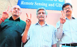 Dalip Singh Jamwal (centre), who was elected president of the Jammu University Teachers Associaiton, along with vice-president Vijay Dev (left) and general secretary Pankaj Srivastava at Jammu University on Monday.