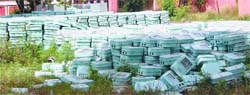 Meter boxes lying in the open outside Head Meter Equipment Laboratory at Verka in Amritsar