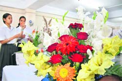 Participants at a flower arrangement competition in Shimla