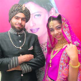 Models display jewels to mark the start of a kundan fest at PP Jewellers.