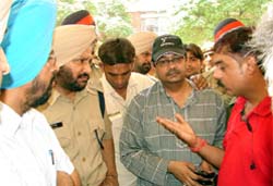 Officials listen to the scribes at Moga Civil Hospital.