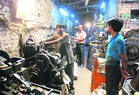 Employees work at a unit in Industrial Area, Phase-I