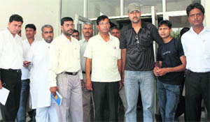 A delegation of parents of private school students after meeting the District Education Officer in Gurgaon on Wednesday.