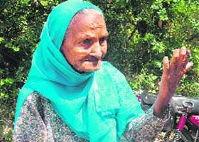 The oldest voter from Kangra constituency Santi Devi (110) after casting her vote at Aima polling station in the Palampur area