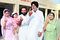 Gurcharan Singh Galib after casting his vote at Galib Kalan village near Jagraon
