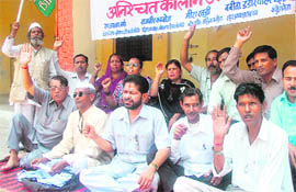 Anjus family members, along with locals, protest in front of City Magistrates office in Haridwar on Thursday. 