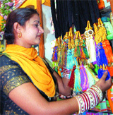 A newlywed sorts out parandas displayed at a shop in Amritsar.