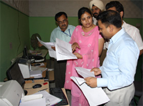 Officials reviewing the preparations at SSD Girls College on the eve of counting.