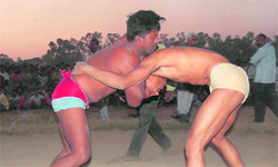 A wrestling bout in progress at the Parade Ground, Dehradun.