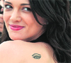  Jury member and Italian actor Asia Argento wears a tattoo on her shoulder